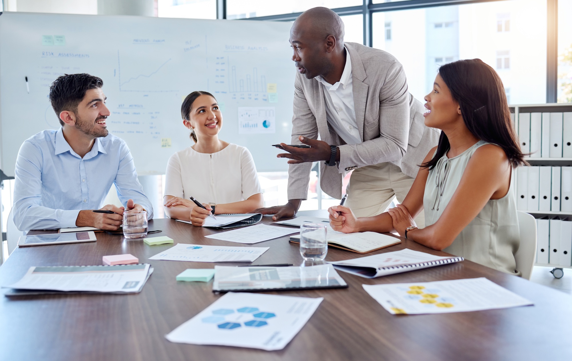 Leadership, coaching and business people in a meeting planning global branding, innovation and anal